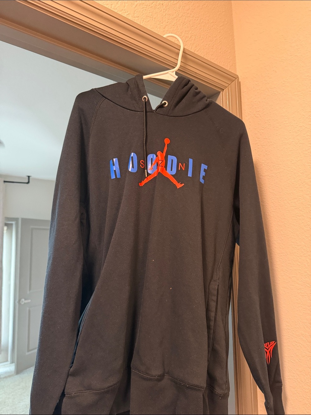 Jordan Black Pullover Hoodie with Red Jumpman and Blue Lettering